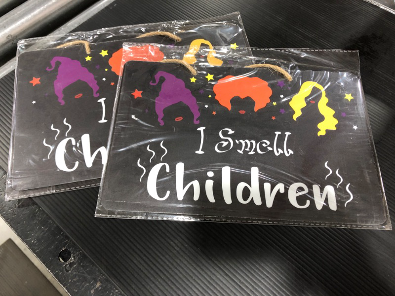 Photo 2 of 2 PACK Uflashmi I Smell Children Door Sign, Hocus Pocus Door Hanger Sign for Halloween Decorations, Halloween Hanging Signs for Home Front Door Wall Decor, Metal, 11x7 Inches 