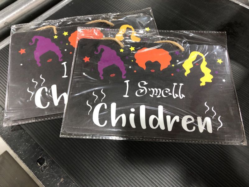 Photo 2 of 2 PACK Uflashmi I Smell Children Door Sign, Hocus Pocus Door Hanger Sign for Halloween Decorations, Halloween Hanging Signs for Home Front Door Wall Decor, Metal, 11x7 Inches
