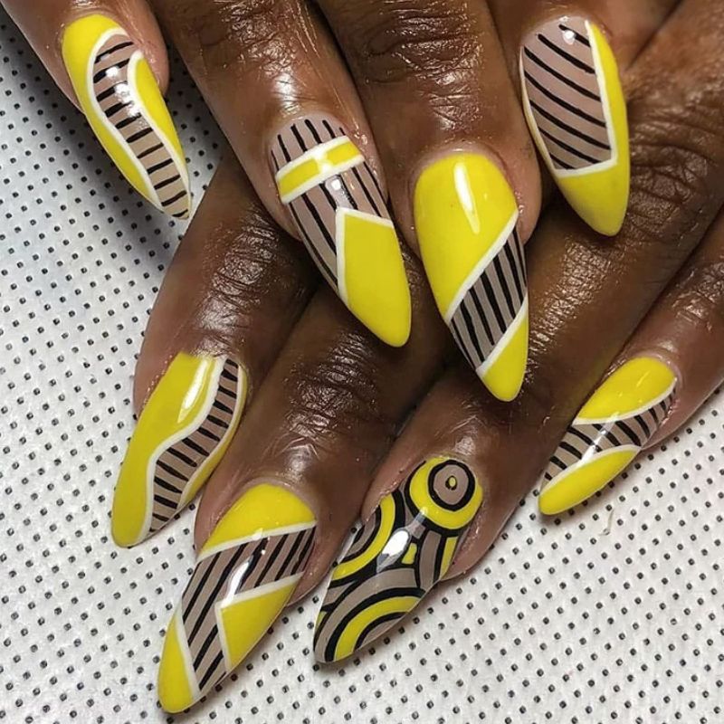 Photo 1 of diduikalor Stiletto Press on Nails Long Fake Nails Yellow Almond False Nails with Black Lines Design Matte Full Cover Stick on Nails for Women (24PCs)