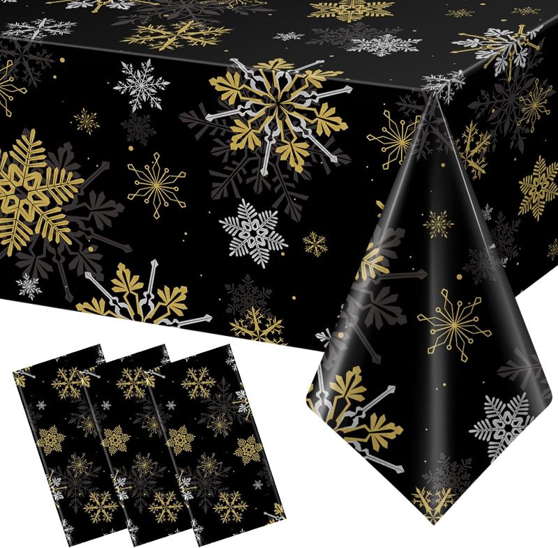 Photo 1 of 3Pcs Christmas Snowflake Party Tablecloths Decorations,Plastic Black and Gold Table Cloth,Winter Rectangle Table Cover for Christmas New Year Birthday Baby Shower Holiday Party Decorations,54x108 inch