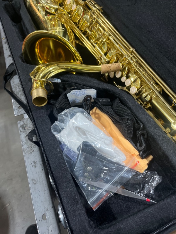 Photo 4 of Glory Gold Laquer B Flat Tenor Saxophone with Case,10pc Reeds,Mouth Piece,Screw Driver,Nipper. A pair of gloves, Soft Cleaning Cloth.