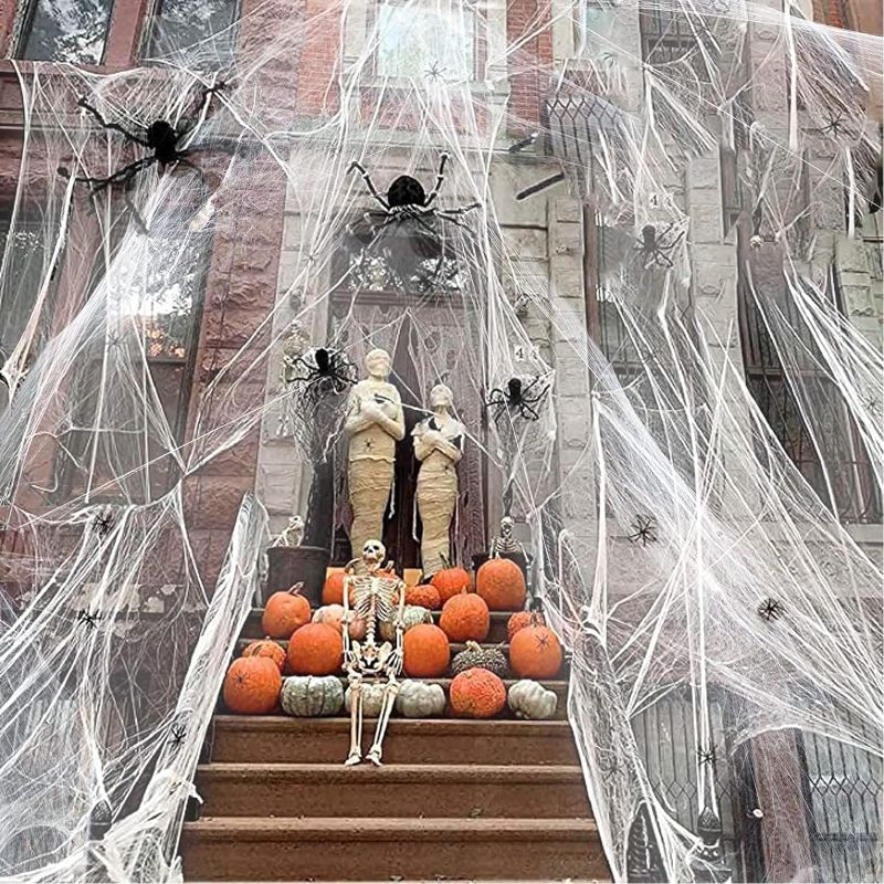Photo 2 of AnNido Halloween Spider Web Decorations, Realistic White Cotton Cobweb, 1200sqft Stretchy Spider Web Decor with 80 Extra Fake Spiders for Home Party, Haunted House Indoor & Outdoor 