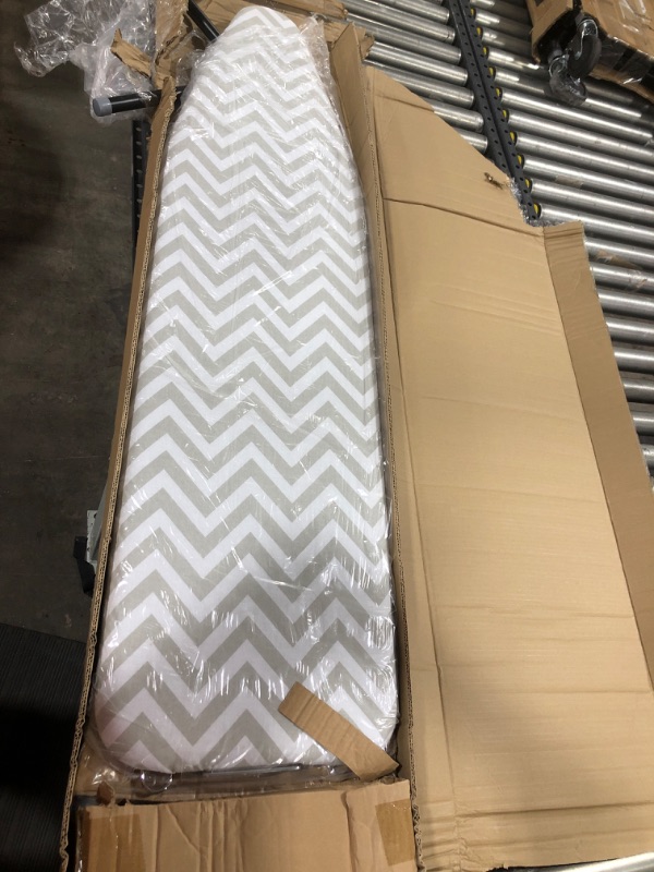 Photo 2 of Amazon Basics Full-Size Ironing Board - 4-Leg Fold-Up, Chevron Removable Cover