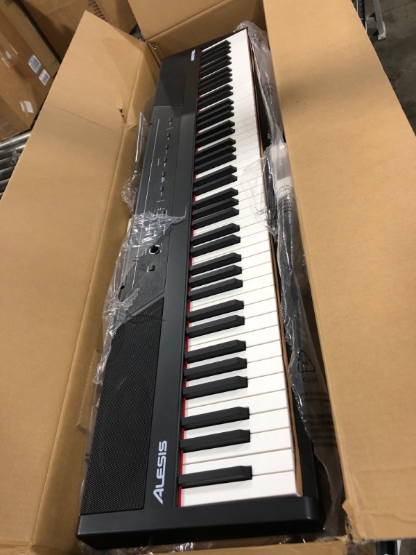 Photo 1 of Alesis Recital – 88 Key Digital Piano Keyboard with Semi Weighted Keys, 2x20W Speakers, 5 Voices, Split, Layer and Lesson Mode, FX and Piano Lessons Recital Piano Only