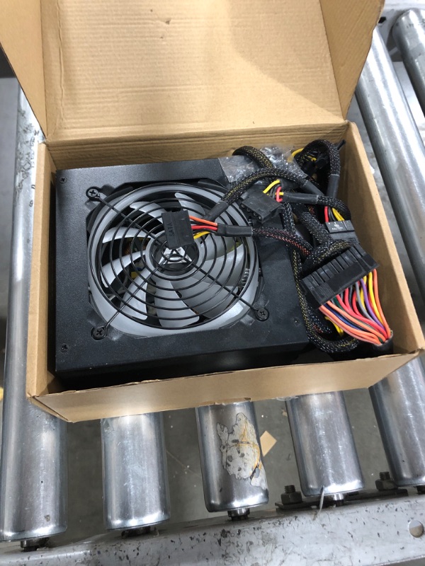 Photo 1 of Apevia SPIRIT600W Spirit 600W ATX Power Supply with Auto-Thermally Controlled 120mm Fan, 115/230V Switch, All Protections