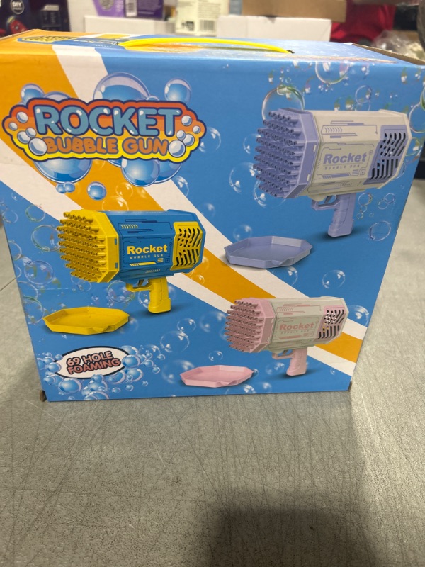 Photo 1 of Bubble Gun Rocket 69 Holes Soap Blaster Machine, Bazooka Bubble Launcher Blower Toys for Kids Outdoor Indoor, Bubble Maker for Party Birthday Wedding(Purple)