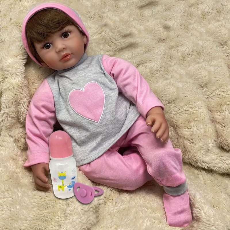 Photo 1 of 22" Baby Doll | Reborn Realistic Baby Doll That Looks Real | Weighted Soft Newborn Silicone Baby Doll Gift Set with Swaddle Blanket, Pacifier Toy, Play Bottle & Birth Certificate 