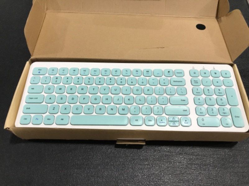 Photo 1 of WIRELESS KEYBOARD & MOUSE COMBO SET. WHITE/TEAL COLORS. OPEN BOX. 