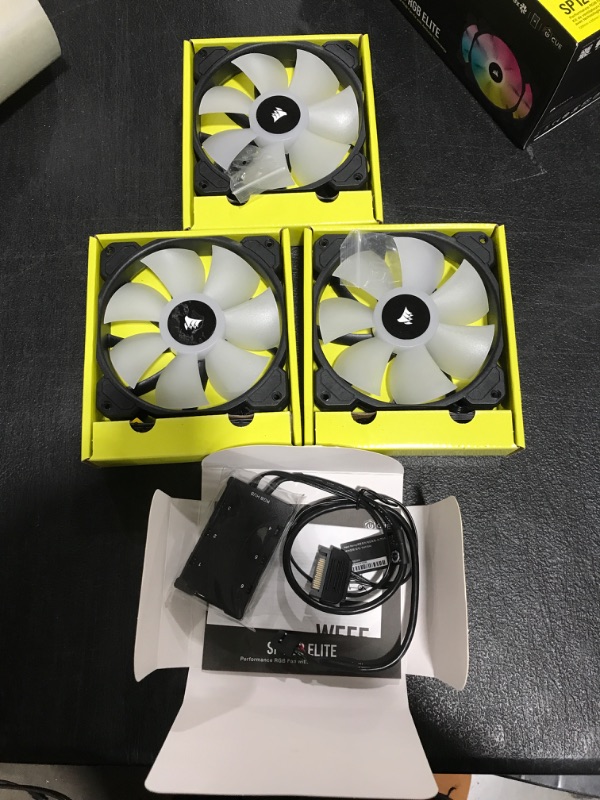 Photo 2 of CORSAIR iCUE SP120 RGB ELITE Performance 120mm PWM Triple Fan Kit with iCUE Lighting Node CORE (Pack of 3), Black 3 Pack with Lighting Node CORE 120mm