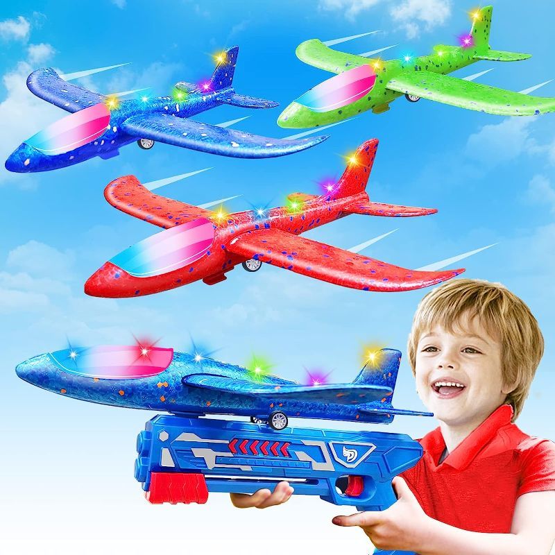 Photo 1 of 3 Pack Led Airplane Launcher Toys, Foam Glider Plane Easter Basket Stuffers Toys for Boys, Outdoor Flying Toys Easter Party Favors for 4 5 6 7 8 9 10 12 Year Old Boys Girls Easter Gifts 