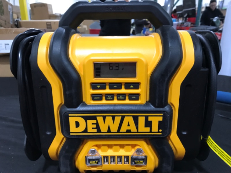 Photo 2 of DEWALT DXAEPS14 1600 Peak Battery Amp 12V Automotive Jump Starter/Power Station with 500 Watt AC Power Inverter, 120 PSI Digital Compressor, and USB Power , Yellow