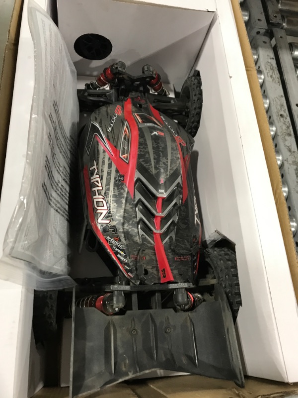 Photo 2 of ARRMA RC Car 1/8 Typhon 6S V5 4WD BLX Buggy with Spektrum Firma RTR (Ready-to-Run), Black and Red, ARA8606V5