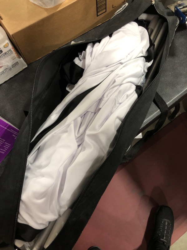 Photo 1 of Large projector screen with white and silver metal stand- unknown screen size