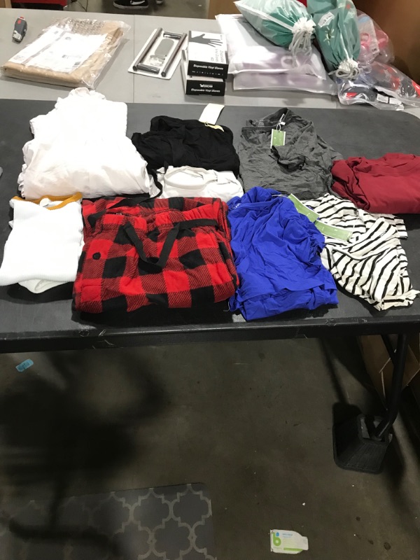 Photo 1 of bag lot misc clothes various sizes 