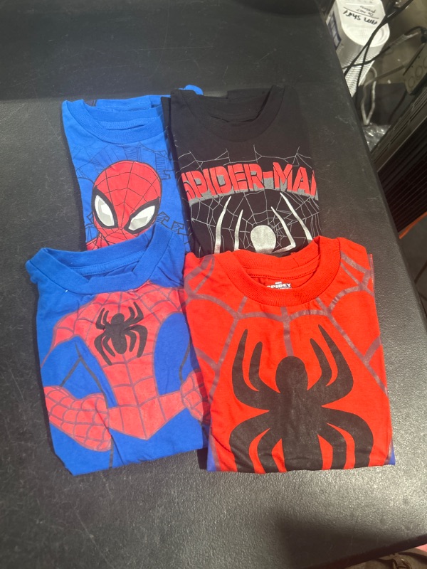 Photo 1 of boys spiderman tshirt
size 5 and 6