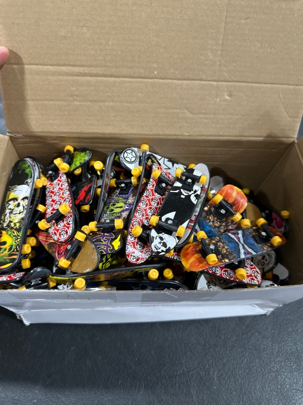 Photo 2 of 100 Pieces Fingerboard Finger Mini Skateboard Toy Finger Boards Set with Double Sided Pattern Creative Novelty Finger Toys Birthday Party Favors Gift for Teens and Adults, Random Pattern