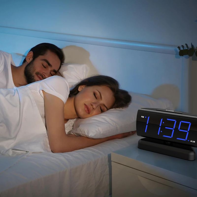 Photo 1 of GING YHAU Home LED Digital Alarm Clock for Bedroom,Swivel Base,Outlet Powered, Simple Operation, Alarm, Snooze, Brightness Dimmer, Big Blue Digit Display (Blue)