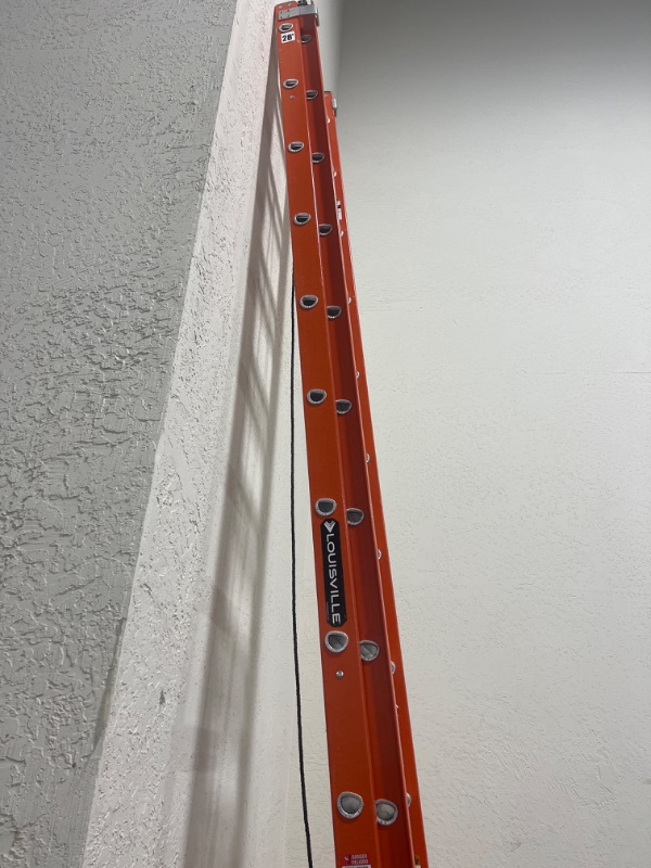 Photo 4 of Louisville Ladder Fiberglass Extension Ladder, 28 feet, 300-pound duty rating, Type IA, FE3228,Orange 28 Feet Ladder