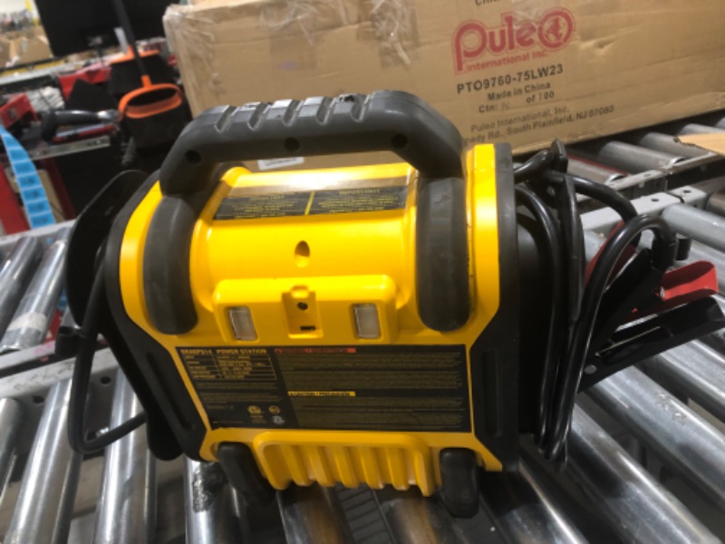 Photo 2 of DEWALT DXAEPS14 1600 Peak Battery Amp 12V Automotive Jump Starter/Power Station with 500 Watt AC Power Inverter, 120 PSI Digital Compressor, and USB Power , Yellow
