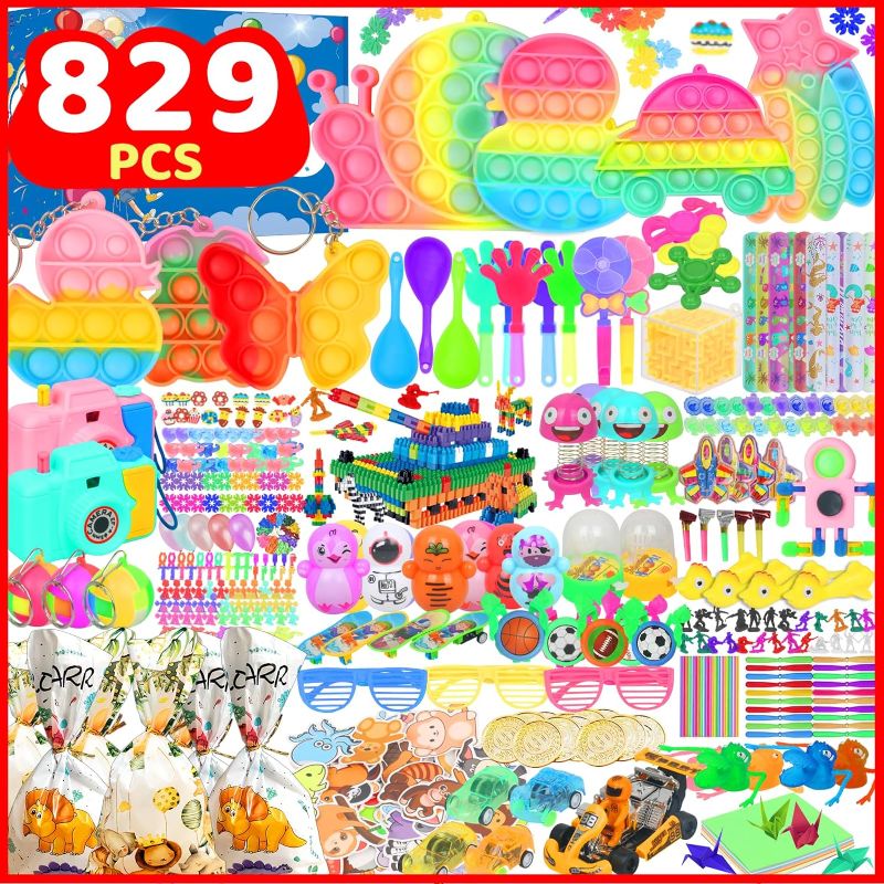 Photo 1 of 829 Pcs Party Favors for Kids, Fidget Toys Pack, Goodie Bags Treasure Box Toys For Classroom Rewards, Bulk Toys, Carnival Prizes, Pinata Filler Stuffers Toys, Birthday Gift Toys for Kids 4-8, 8-12