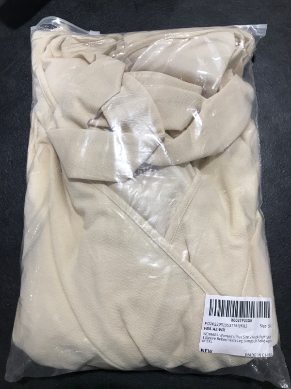 Photo 2 of [Size 5XL] WDIRARA Women's Plus Size V Neck Puff Short Sleeve Belted Wide Leg Jumpsuit 5X-Large Plus Solid Apricot