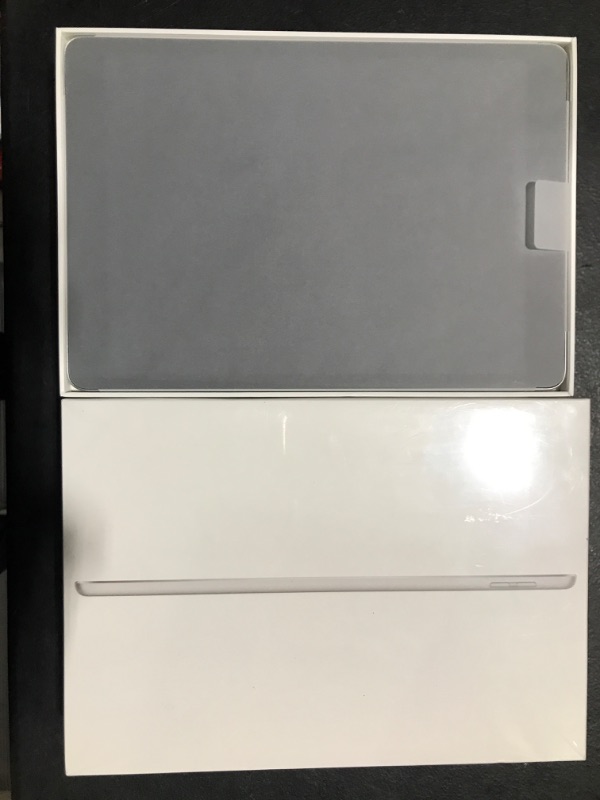 Photo 2 of BRAND NEW--Apple iPad (9th Generation): with A13 Bionic chip, 10.2-inch Retina Display, 64GB, Wi-Fi, 12MP front/8MP Back Camera, Touch ID, All-Day Battery Life – Silver
