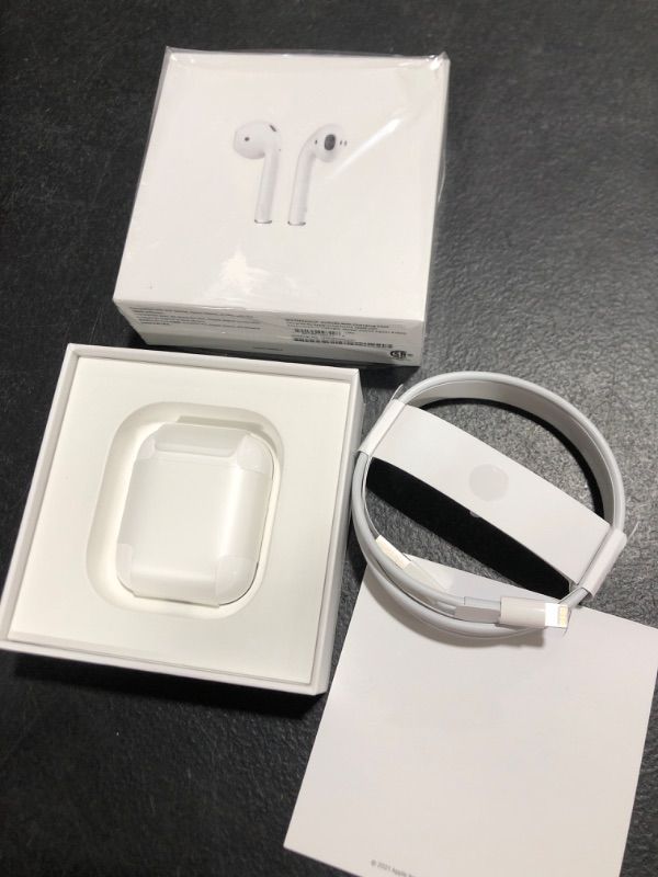 Photo 2 of AirPods with Charging Case (Brand New)