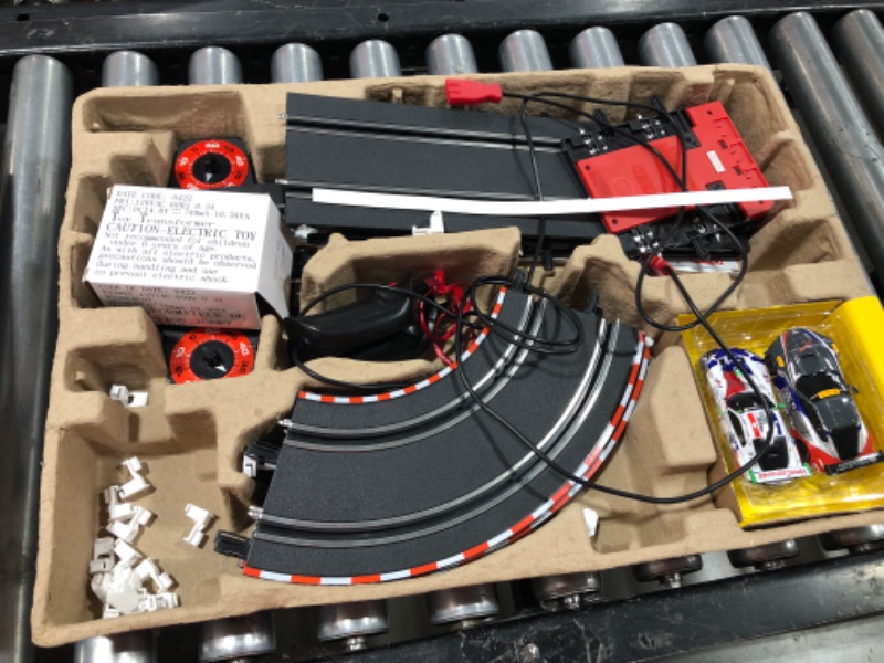 Photo 2 of Carrera GO!!! 62521 onto The Podium Electric Powered Slot Car Racing Kids Toy Race Track Set Includes 2 Hand Controllers and 2 Cars in 1:43 Scale