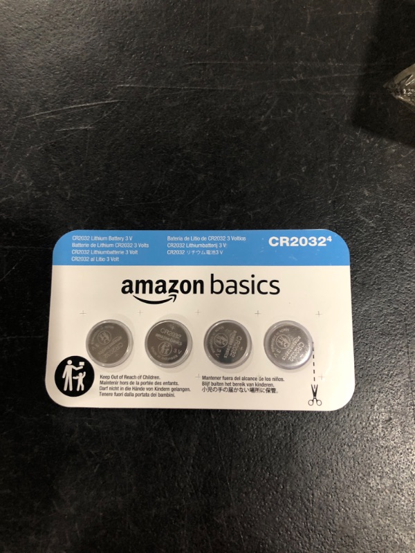 Photo 2 of Amazon Basics 4-Pack CR2032 Lithium Coin Cell Battery, 3 Volt, Long Lasting Power, Mercury-Free 4 Count (Pack of 1) CR2032