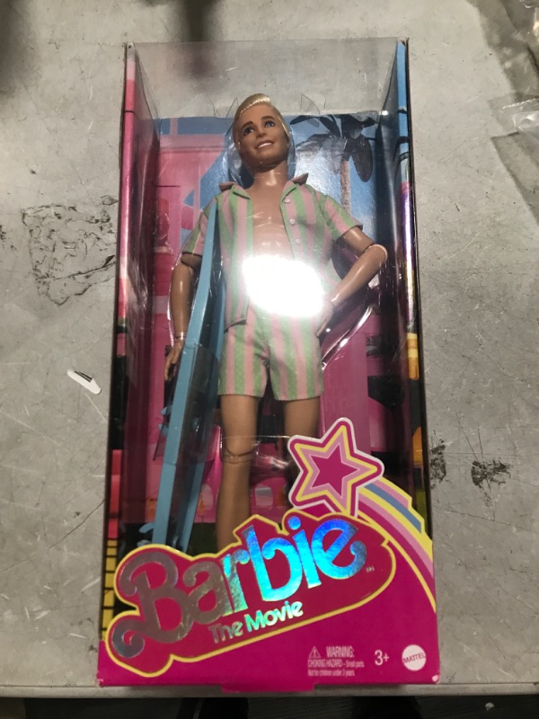 Photo 2 of Barbie The Movie Ken Doll Wearing Pastel Pink and Green Striped Beach Matching Set with Surfboard and White Sneakers