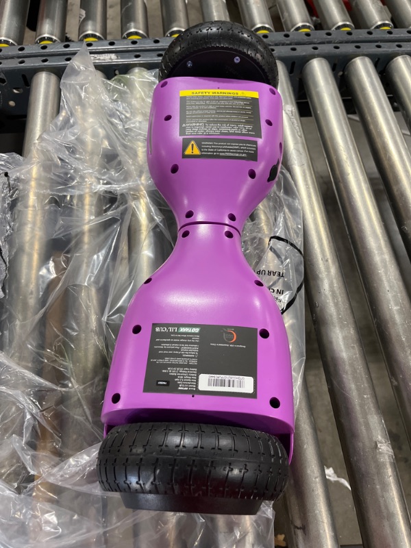 Photo 4 of Gotrax Lil CUB Hoverboard for Kids, 6.5" Wheels & LED Front Light, Max 2.5 Miles and 6.2mph Power by Dual 150W Motor, UL2272 Safety Certified Self Balancing Scooter Gift for 44-88lbs Kids Age 6-12 purple