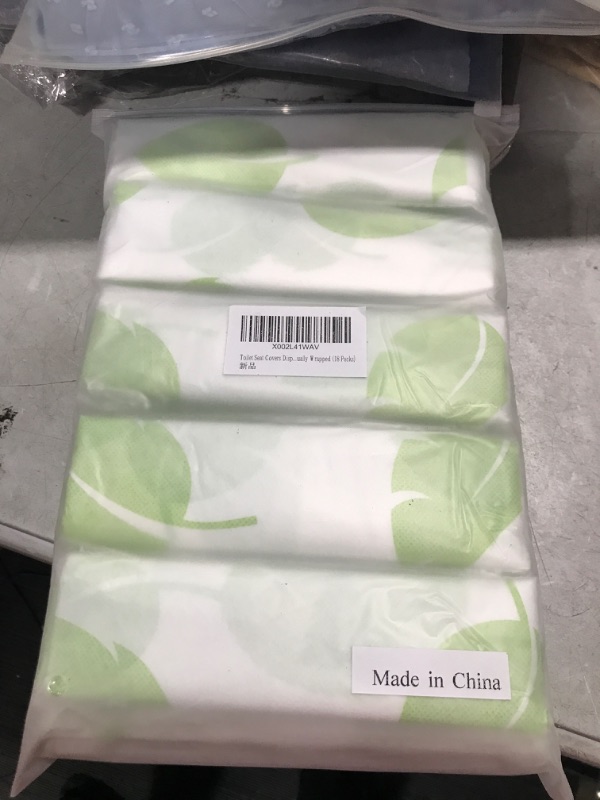 Photo 1 of 18 packs of toilet seat covers