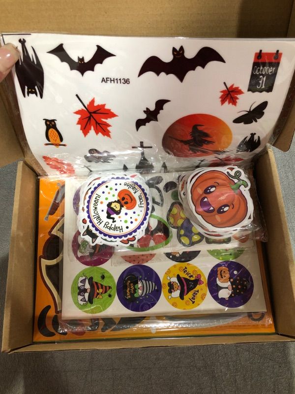 Photo 2 of Halloween Stickers for Home Party Decoration, 147 Papers Halloween Themed Stickers Including Window Clings, Glow in the Dark Ghost Sticker, Pumpkin Bat Witch Sticker for Kids and Adult