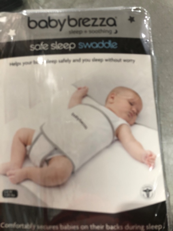 Photo 2 of Baby Brezza Safe Sleep Swaddle Blanket for Crib Safety for Newborns and Infants – Safe, Anti-Rollover Blanket in White, by Tranquilo Reste