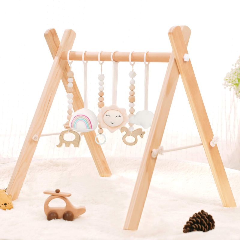 Photo 1 of Baby Gym with 6 Wooden Baby Toys, Foldable Baby Play Gym, Wooden Play Gym Frame Activity Gym Hanging Bar Newborn Gift Baby Girl and Boy Gym, Play Gym for Infants Aged 0-3, 3-6, 6-12 Months
