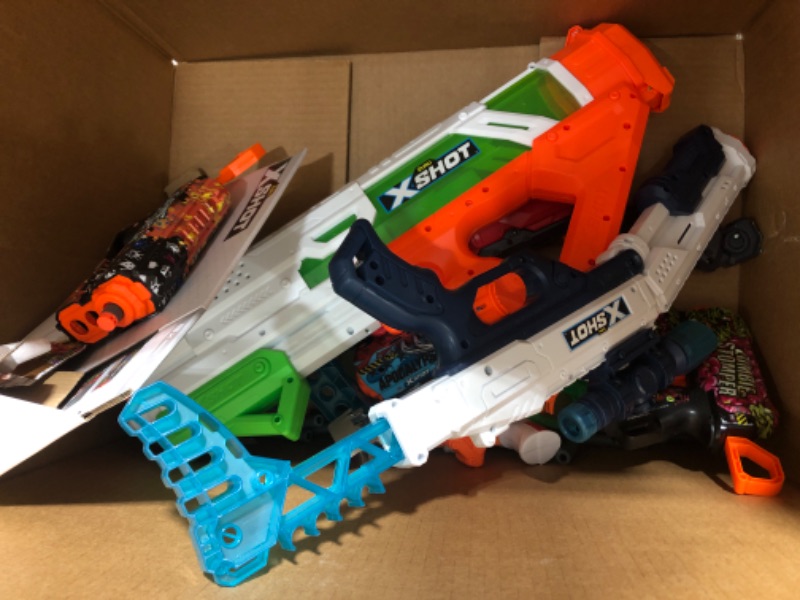 Photo 1 of ASSORTED MIX OF WATER GUNS AND DART GUNS