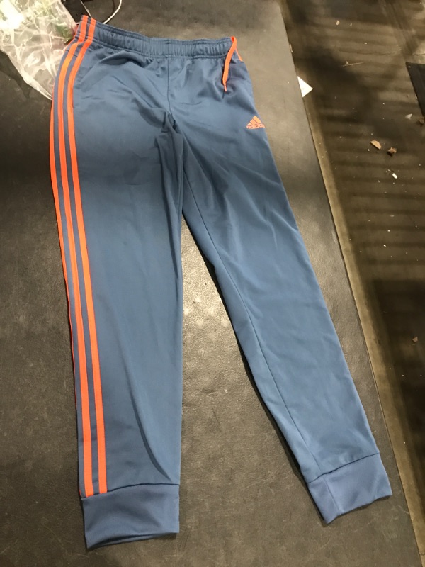 Photo 1 of adidas track pants