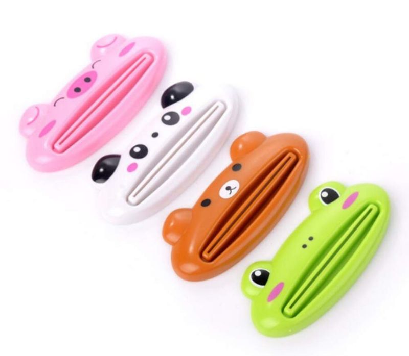Photo 1 of 2 PACK -WOIWO 4PCS Cartoon Toothpaste Squeezer Korean Version, Manual Toothpaste Squeezer Lazy Cosmetics Cleanser Squeezer 