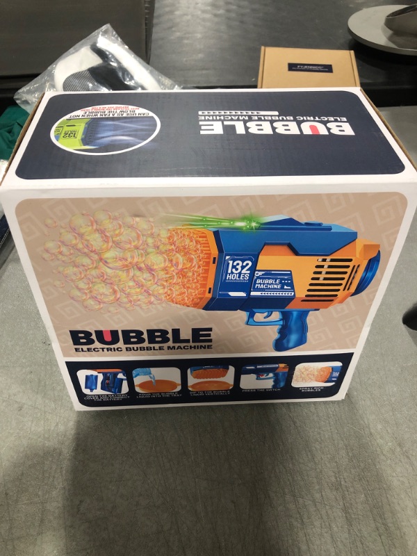 Photo 2 of 132 Holes Bubble Gun Machine - Rocket Bubbles Blaster with Led Lights Summer Idea Gifts Toys for Kids Boys Girls 3 4 5 6 7 8 9 10 11 12 Years Old (Blue) 132 Holes Blue