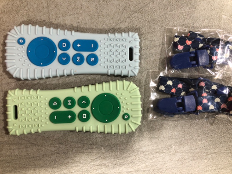 Photo 1 of 2 pack baby toys remotes blue and green 