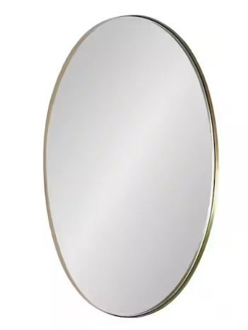 Photo 1 of 30.00 in. H x 20.00 in. W Rollo Modern Oval Framed Gold Accent Wall Mirror
