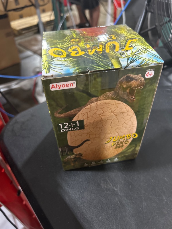 Photo 2 of Alyoen Dino Egg Dig Kit, Jumbo Dino Egg Dig with 13 Suprise Dinosaur Egg Toys in One Giant Filled Eggs, Dinosaur Eggs Excavation Kits for Kids 3-7, Boys Archaeology Science STEM Christmas/Xmas Gifts