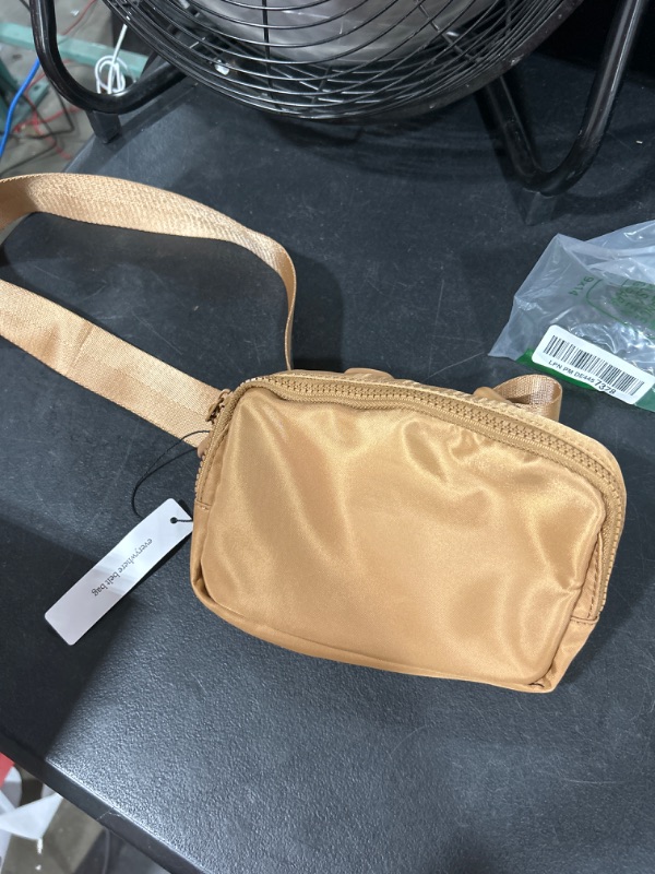 Photo 1 of Fanny Pack for Women Fashion Crossbody Belt Bag Water Proof Mini Waist Bag Bum Bag with Adjustable Strap for Running Travel Brown
