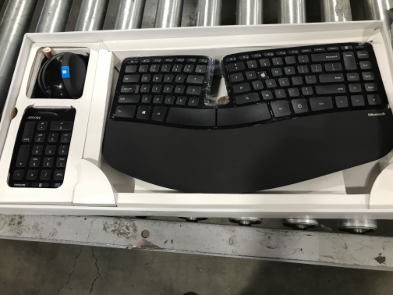 Photo 1 of Microsoft Sculpt Ergonomic Wireless Desktop Keyboard and Mouse - Black. Wireless , Comfortable, Ergonomic Keyboard and Mouse Combo with Split Design and Palm Rest.