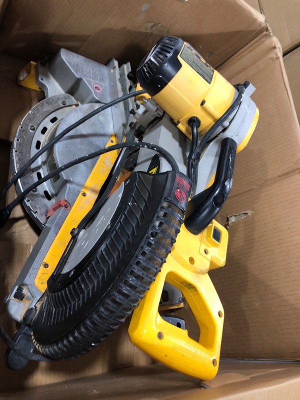 Photo 2 of *FOR PARTS ONLY* DEWALT Miter Saw, 12 Inch, 15 Amp, 3,800 RPM, Double Bevel Capacity, With Sliding Compound, Corded With Miter Saw Stand (DWS780 + DWX724)