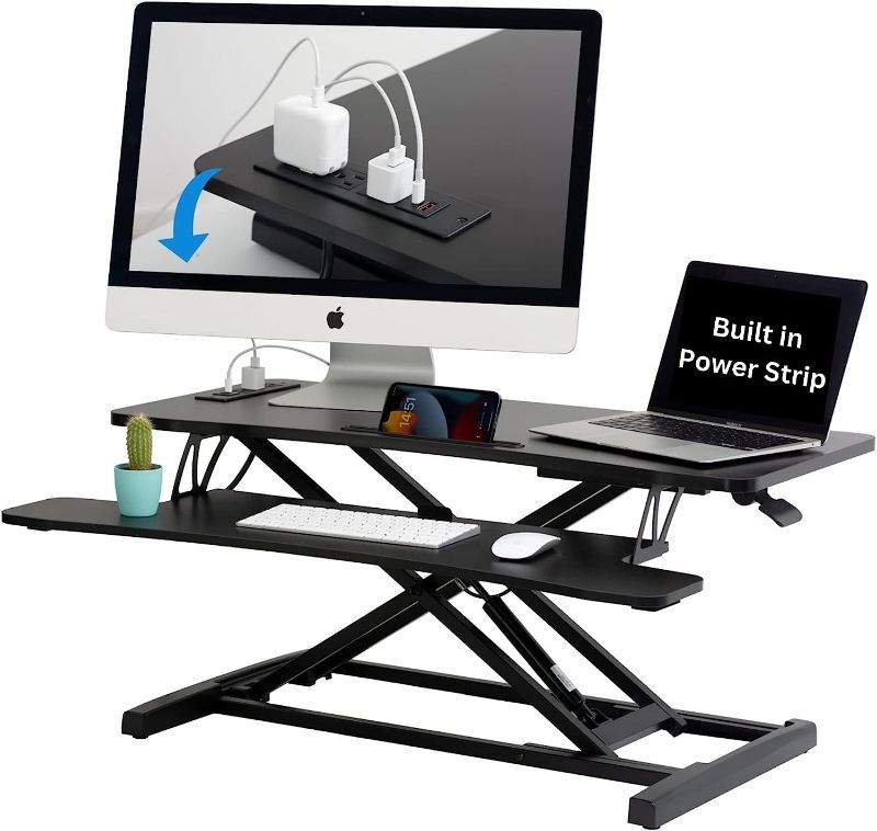 Photo 1 of SIMBR Standing Desk vm-gs201214