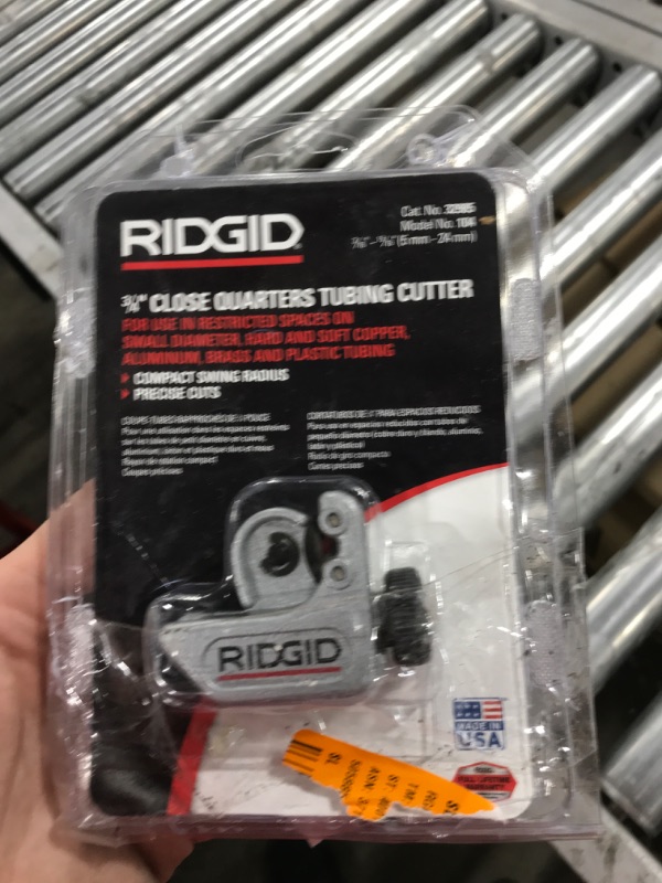 Photo 2 of RIDGID 32985 Model 104 Close Quarters Tubing Cutter, 3/16-inch to 15/16-inch Tube Cutter & Rapid Repair RP77271 1/8 Inch to 1-5/8 Inch Outside Diameter Pipe and Tubing Reamer, Red (Single Pack) Copper + Pipe And Tubing Reame