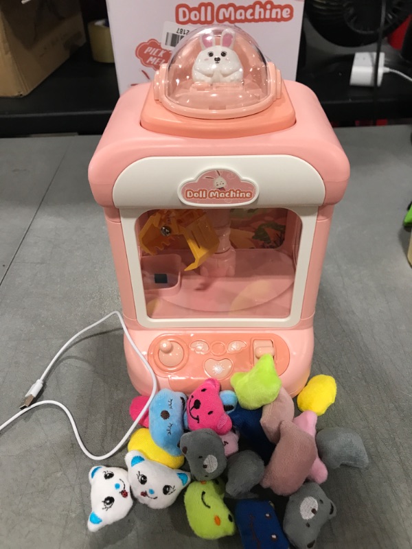 Photo 2 of Claw Machine for Kids,Mini Vending Machines Candy Grabber Prize Dispenser Toys for Girls, Boys Electronic Arcade Claw Game Machine for Party Birthday Easter Gifts with Lights Sound&20 Mini Plush Toys