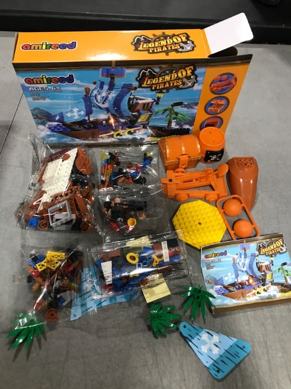 Photo 1 of amireed Pirate Ship Toy, Pirate Ship Toys for Boys with 3 Minifigures, Treasure Island Toys, 235pcs Pirate Ship Toys for Kids Ages 6+ Indoor Birthday Party