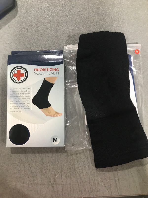 Photo 2 of Doctor Developed Ankle Brace/Compression Sleeve/Ankle Support - & Doctor Written Handbook - Protector/Guard with Silicon Gel Pad for Foot Support [Single] (Black, M) Black M